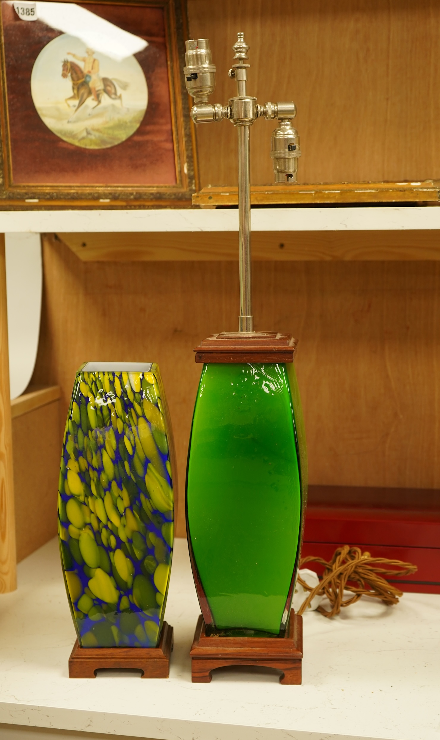 A modernist green glass lamp base another another example, largest 66cm high